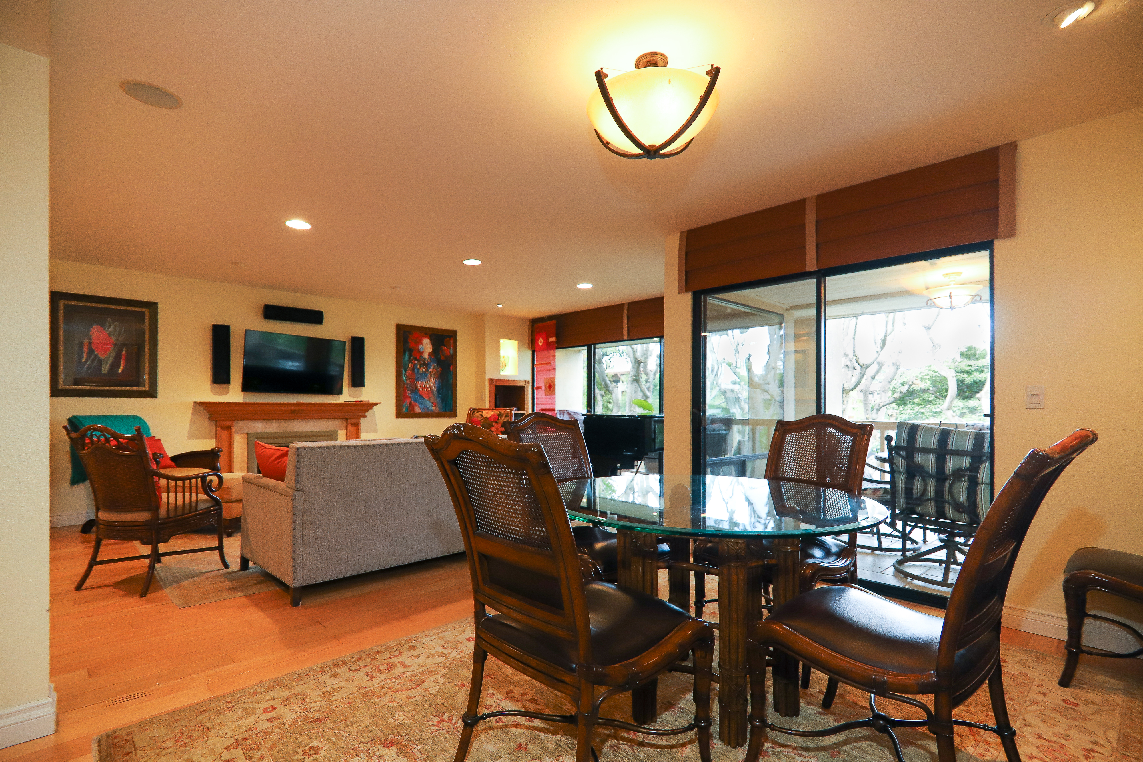 Spacious living room open to dining and patio