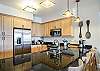 Condo 7203 - Fully Furnished Kitchen with Breakfast Bar