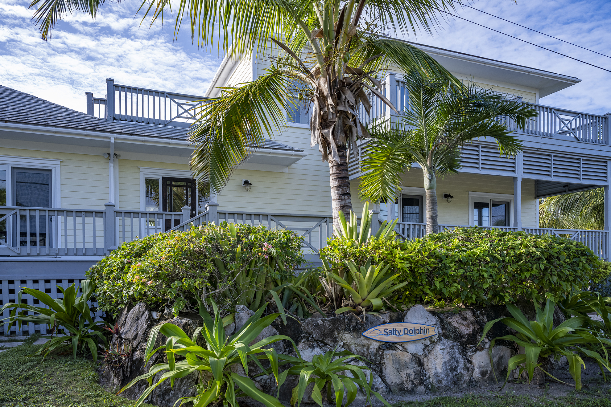 Salty Dolphin House (formerly Richview) is a newly remodeled, luxurious, 4-bedroom, 4-bath home. 
Located on the historic Banks Road, directly across from French Leave Beach, the premier location on Eleuthera, a mile from the town of Governor’s Harbour an