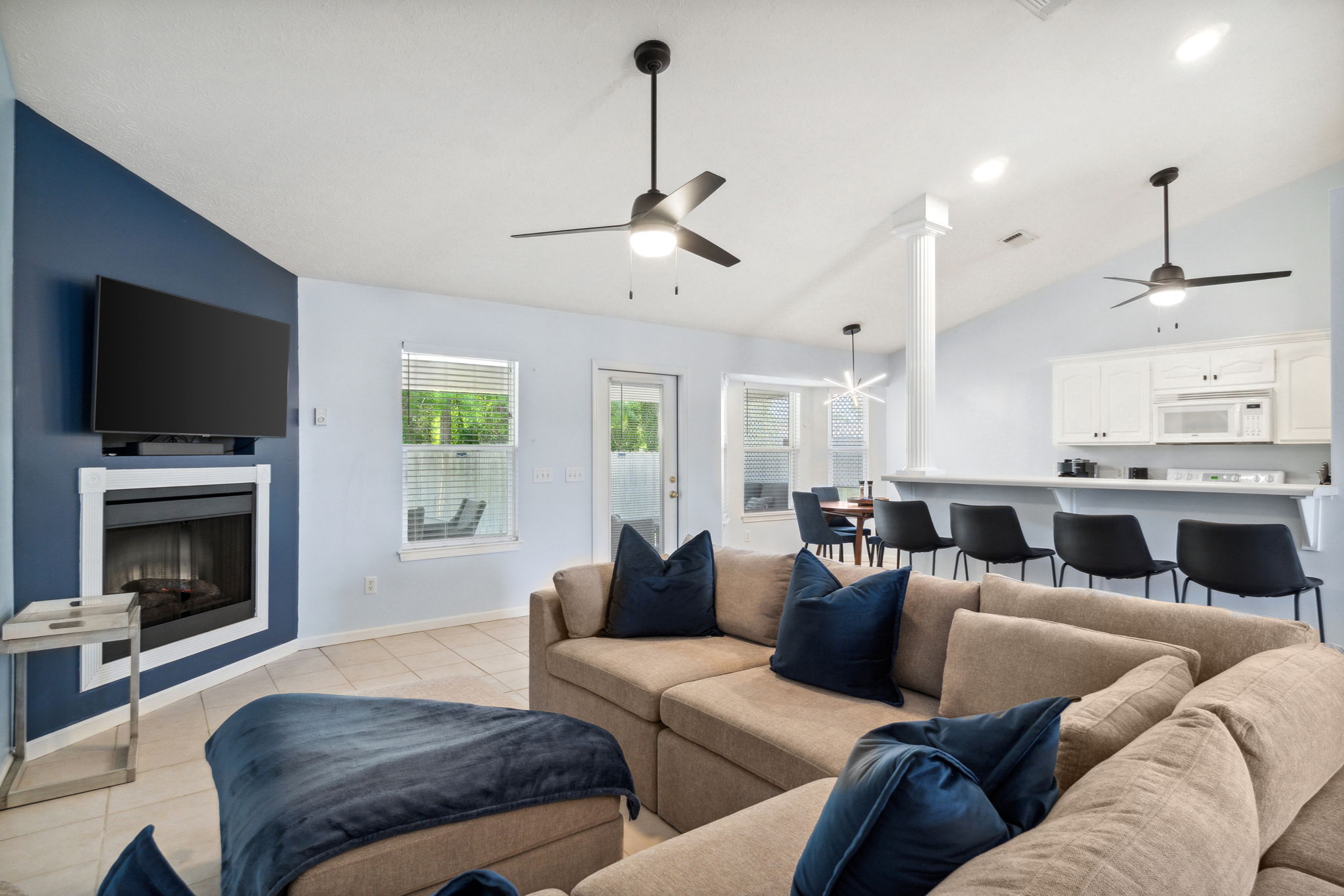 Spacious open living room and kitchen at the pet-friendly Lagoon Oasis vacation home