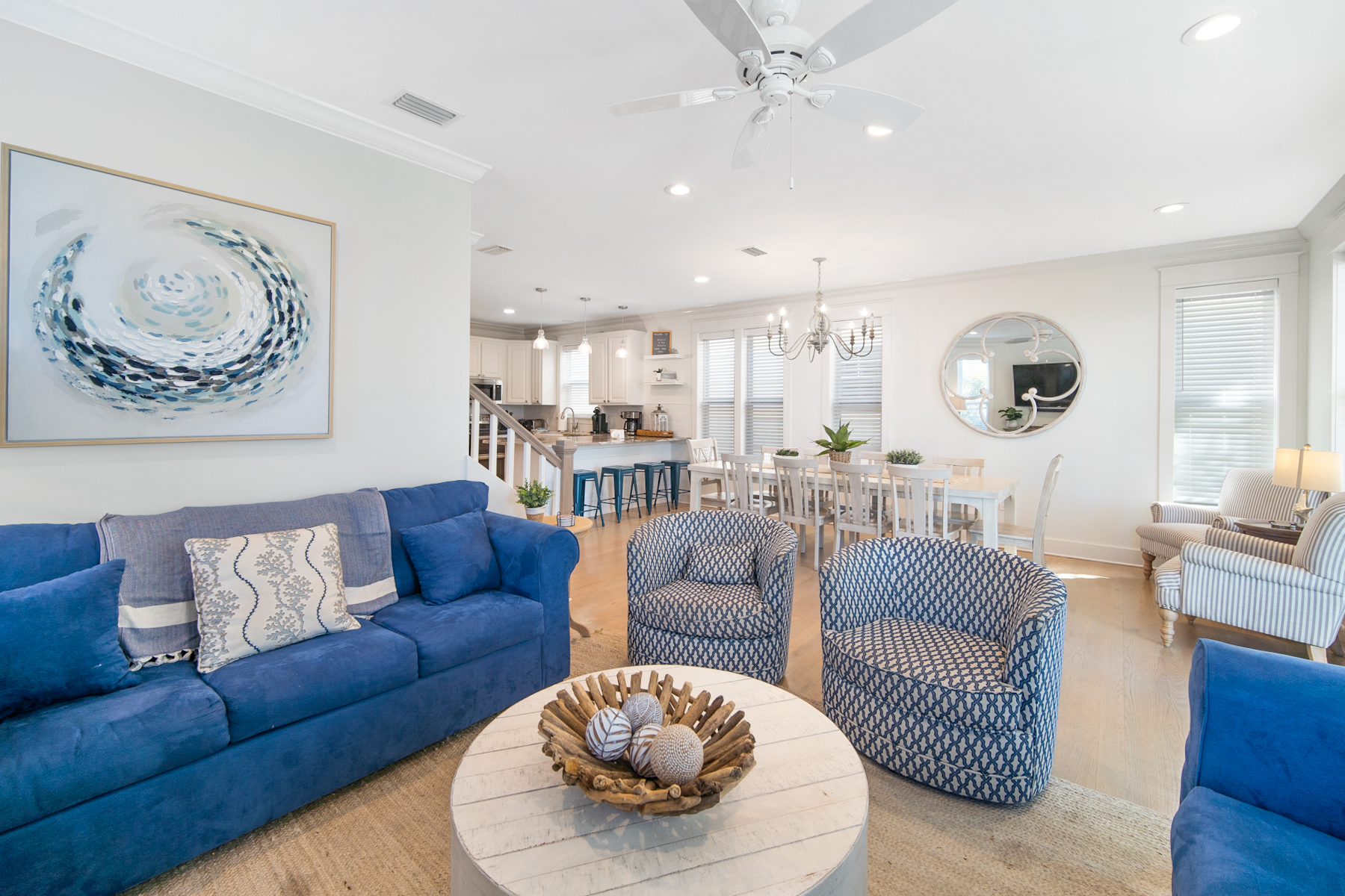 Open living room, dining area and kitchen inside Beauty and the Beach near Inlet Beach and 30A