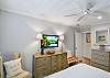 Catch your favorite show from bed or wind down with a book by the window—this alternate angle of the primary bedroom shows off the spacious layout, soft lighting, and easy flow that makes relaxation effortless.
