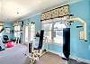More ways to move—this secondary view of the Ocean Walk fitness center shows strength equipment and sunny workout space.