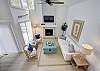 The vaulted ceilings at Sea Glass Cottage open up the entire living space—shown here from the upstairs landing. It’s one of those homes that just feels bigger than expected, in all the right ways.