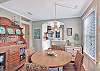 A view from the dining area into the bright kitchen at 204 Ashantilly Avenue—everything flows easily for meal prep, family dinners, or late-night snacks.

