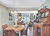 The dining area at 204 Ashantilly Avenue blends into the bright living space, with room for home-cooked meals, game nights, or morning coffee before the beach.

