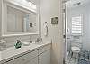 This full bath includes a wide vanity, natural light, and a tub-shower combo with a glass door. It’s perfect for rinsing off the day or giving the kids a quick soak before dinner on Mallery Street.