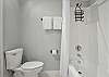 A full-size tub and shower, plus thoughtful touches like hanging towel hooks and good pressure. Clean, simple, and built for comfort after long beach days.