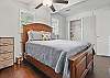 Here’s another look at the ensuite queen bedroom—showing off the roomy layout, warm wood furnishings, and just how much space you’ll have to stretch out. It's quiet, private, and built for sleep you can brag about.

