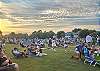 People enjoying a free concert at Cape Charles Park