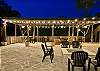 40' Party Pavilion, flagstone courtyard and custom rock fire pit.