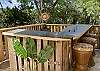 The completely private Party Pavilion bar has Tommy Bahama bar stools, tv, mini fridge and beautiful views.