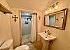 Bunk room Bathroom 3 for bunk room is light and bright with beautiful shower.