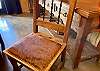 Custom cowhide dining chairs.