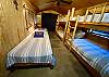 Spacious and cool Bedroom 3 bunk room has 2 bunk beds & 2 twin beds.