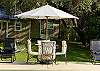 One of three poolside al fresco dining spots.