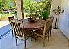 Cabana al fresco dining with custom dining table & chairs. 