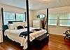 Beadboard ceiling, original wood floors & lots of windows for light.