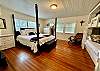 River House has Pottery Barn King bed, custom built-in twin bunk beds, wood floors, beadboard ceiling & orignial wood floors.