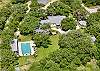 Agave Point is a historic gated estate with mature shade trees, high fenced for privacy and views.