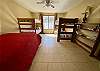 Bedroom 2 - views of the Frio River, 2 twin bunk beds and a double bed.