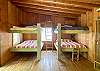 The Fish Camp has 2 double double bunkbeds, vaulted ceilings, original wood floors, views of river.