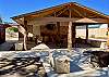 Rock Seating by the fire pit and on both sides of the Cabana.