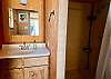 Downstairs bathroom with shower.