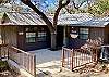 Cute Cabin in a perfect location on the Frio River in downtown Concan. Patio and deck with views.