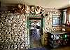 The cabin has river rock walls.