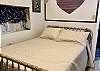 BEDROOM 1 HAS A FULL BED AND ENSUITE BATHROOM.