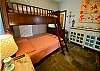 Upscale furnishings, tile floor, twin over double bunk bed and ensuite bath.