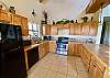 Well stocked kitchen with views.