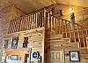 Vaulted 30' ceiling, cedar walls, staircase with balcony, large living room. All rooms except 1 overlooks the Frio River! 