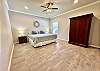 Huge downstairs master Bedroom 1 overlooks the pool.