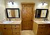 Jack & Jill bathroom had separate double sinks & double mirrors apart from the shower and toilet.