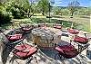 Outdoor seating area under the shade trees.