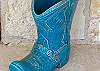 Everyone needs art, especially a turquoise cowboy boot.