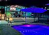 Night time lights at the poolside Cabana.