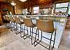 White rock island bar with 6 chairs.