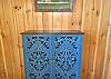 Check out the picture of the property hanging over this pretty cabinet.