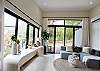 The master bedroom is on a higher elevation with a private terrace and overlooking the garden.