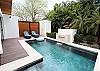 A terrace that opens to the patio and green areas where you can enjoy the views to the garden and pool area.