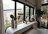 The master bedroom is on a higher elevation with a private terrace and overlooking the garden.