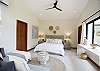 The master bedroom is on a higher elevation with a private terrace and overlooking the garden.