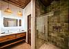 Pamper yourself in Casa Milagro’s sleek ensuite bathroom. Unwind after an exciting day of scuba diving or catamaran cruises with customized in-villa spa treatments.