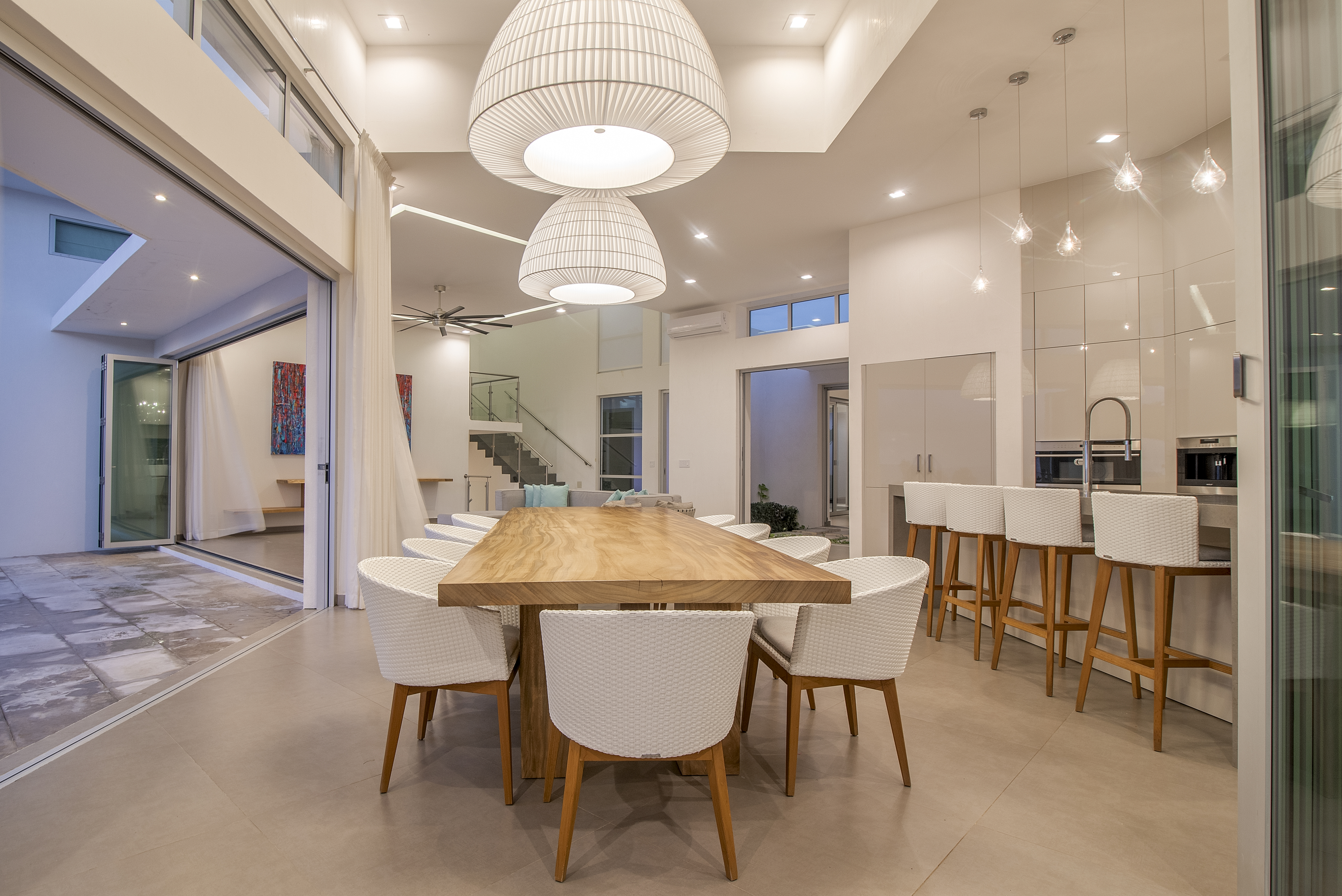 Dining Table View of Exterior & Kitchen