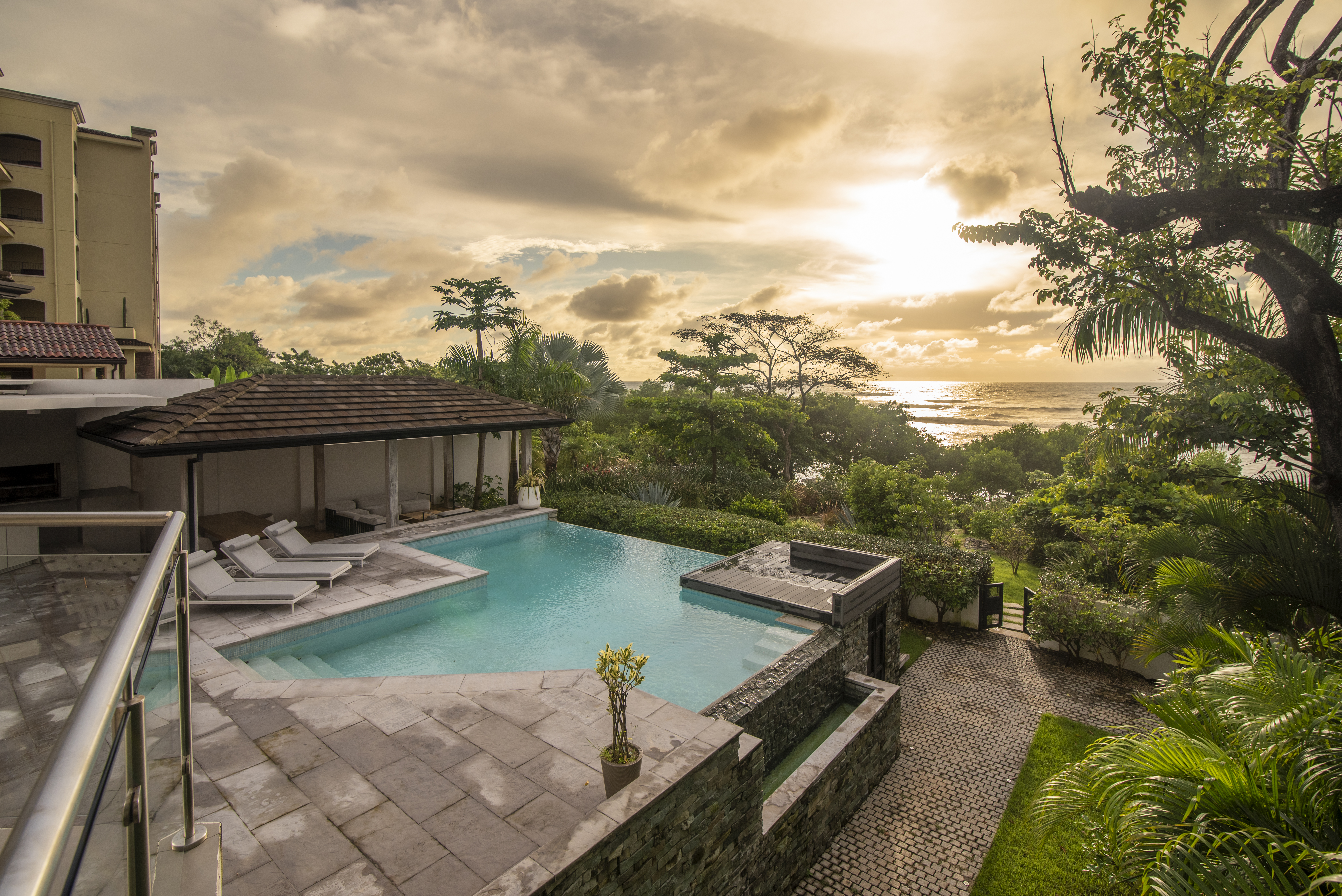Upper Suite Balcony View of Pool & Ocean