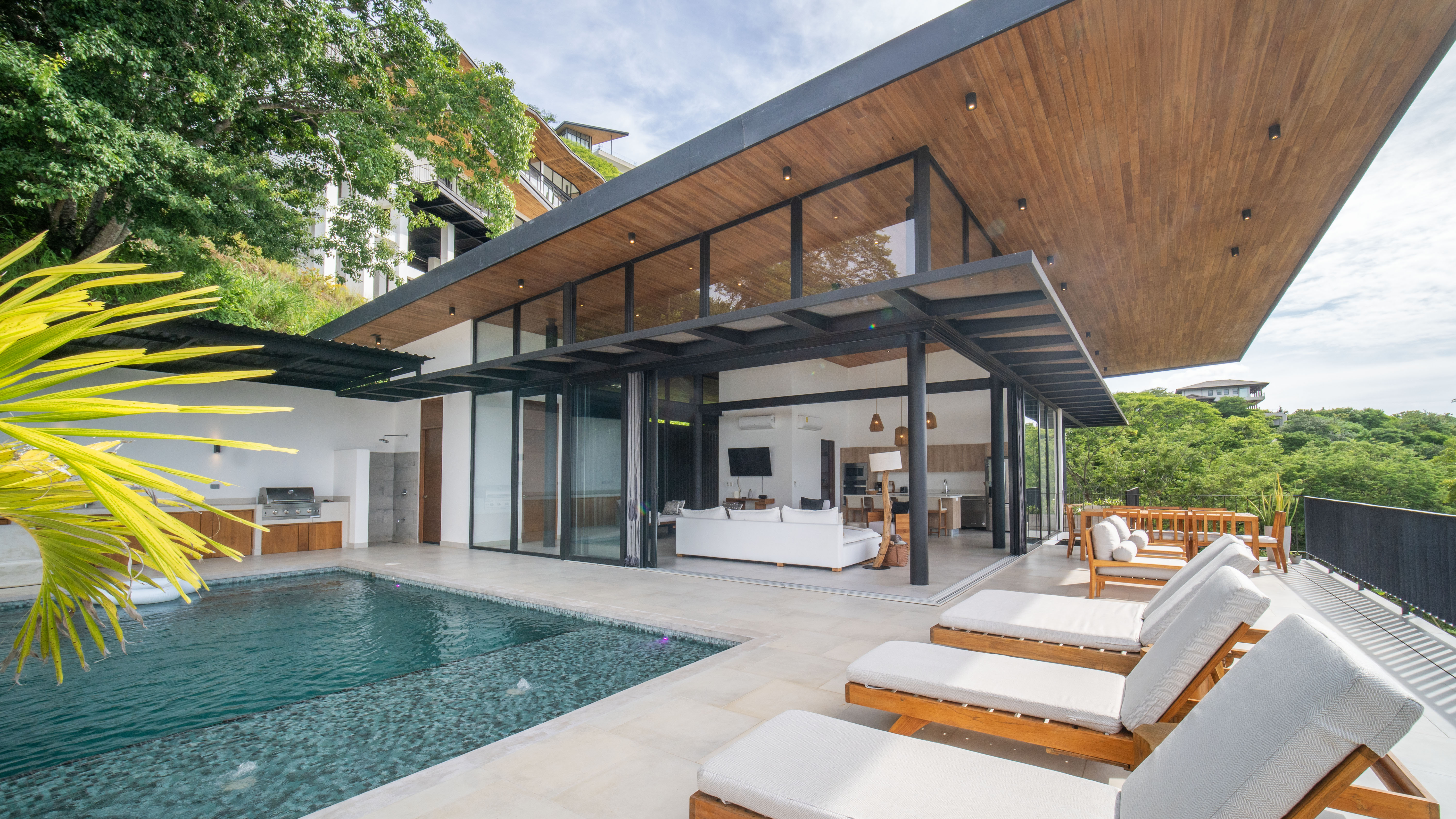 Pool area with comfortable chairs 