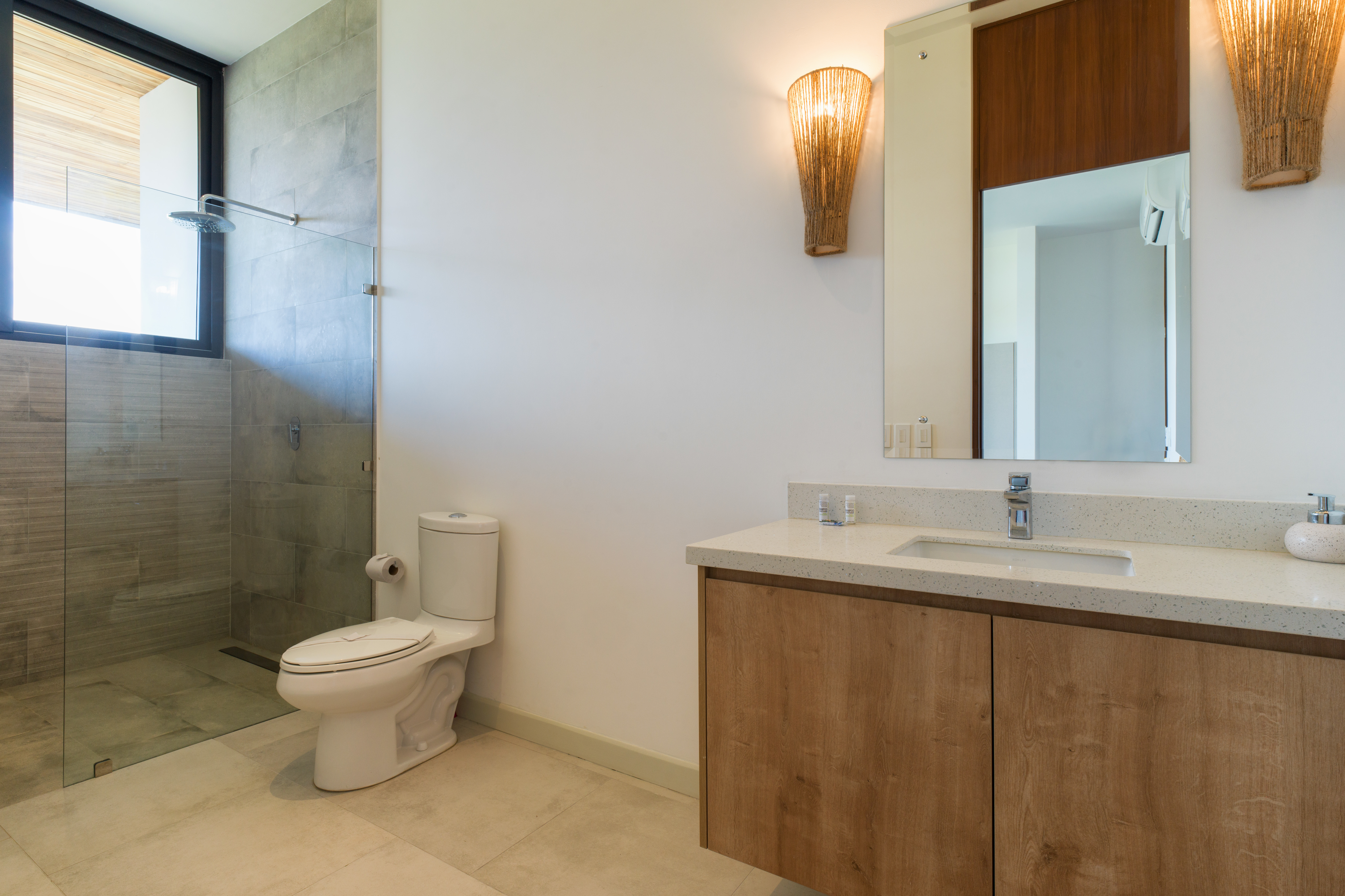 Modern bathroom with natural light and elegant finishes